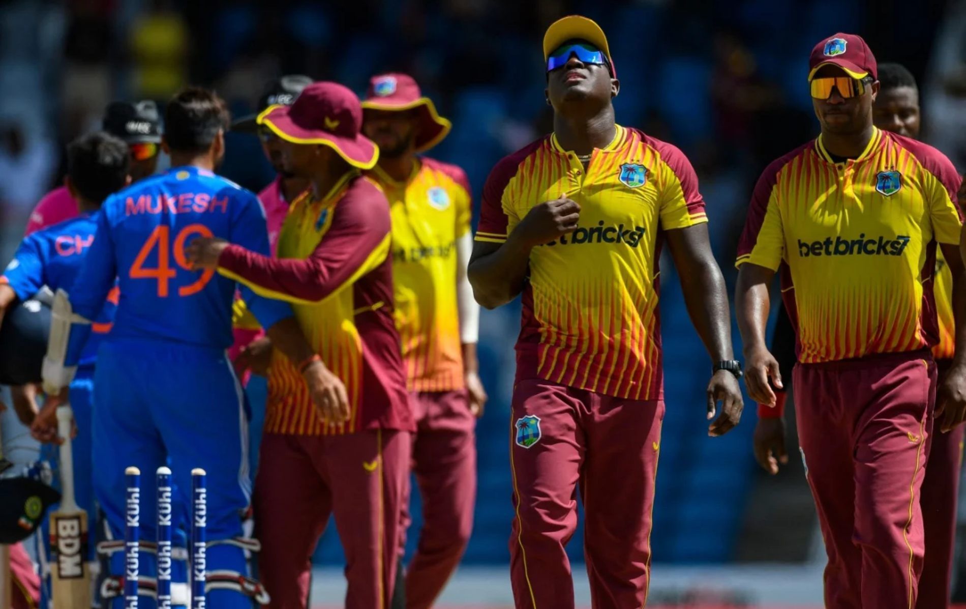 Rovman Powell and his team after beating India