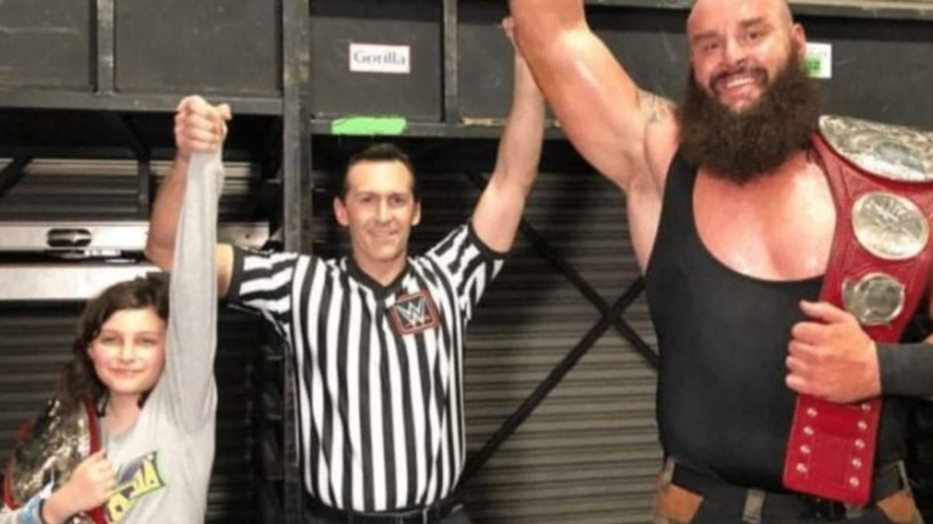 Nicholas with his father, John Cone, and Braun Strowman