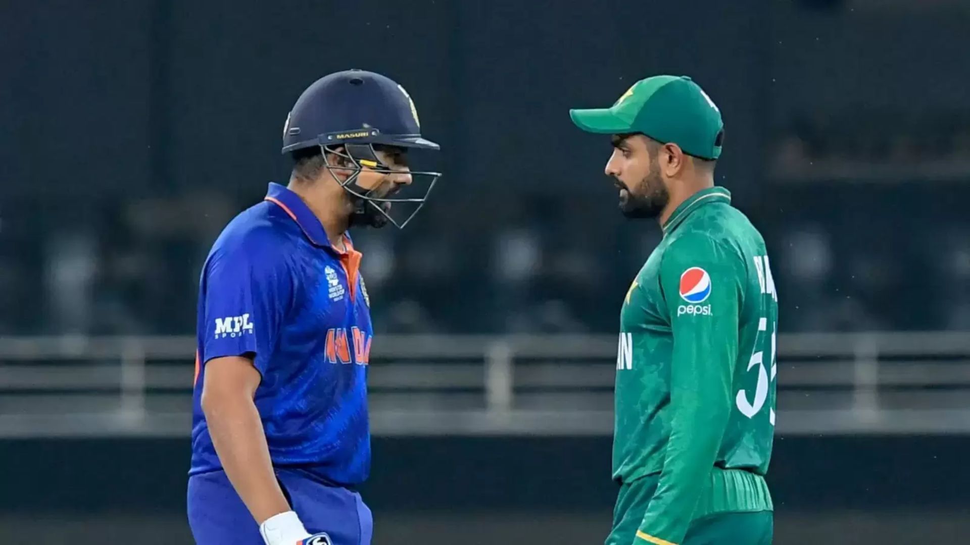 Rohit Sharma (L) and Babar Azam will lead their teams into another India-Pakistan encounter on Saturday (P.C.:X)