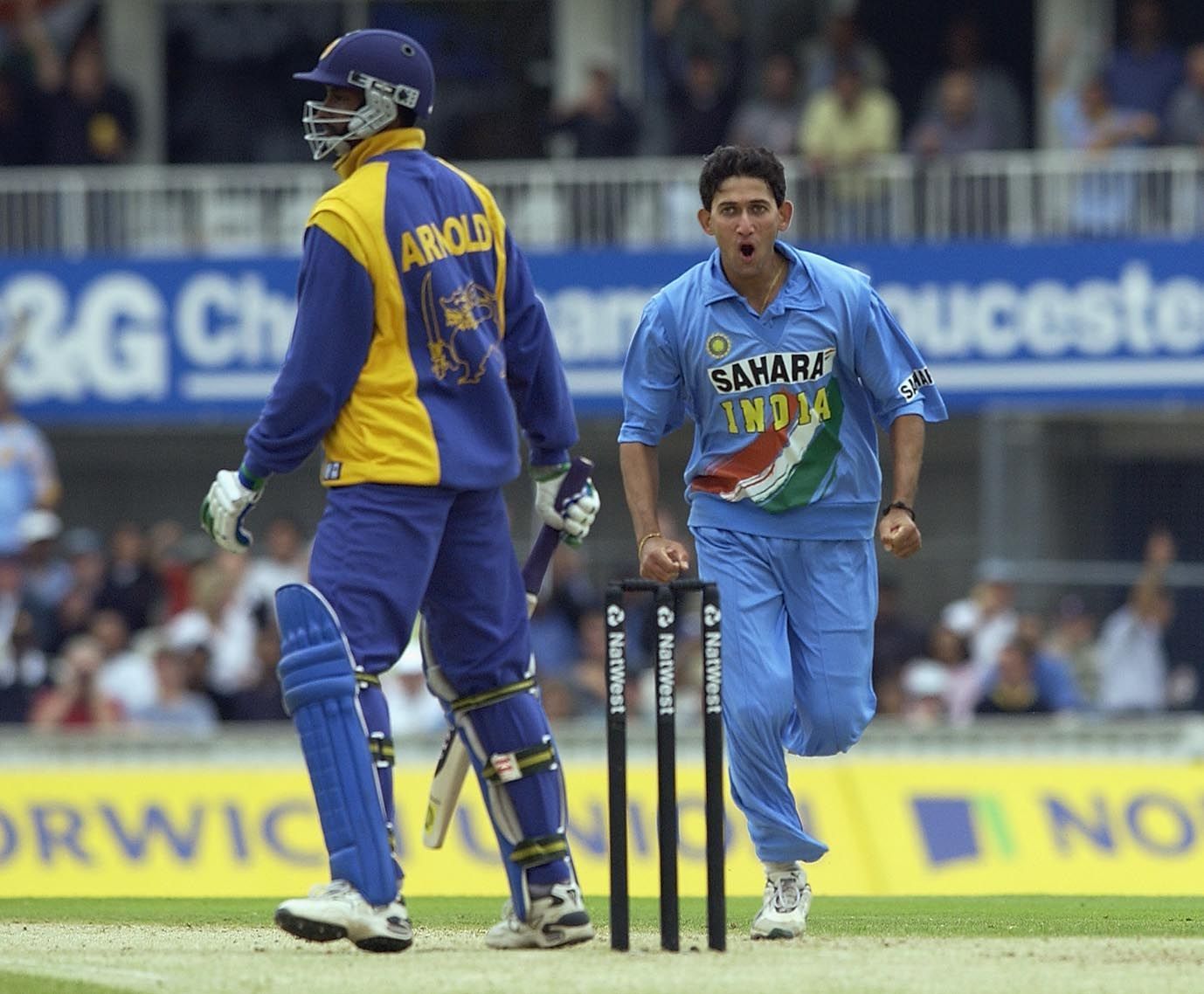 Agarkar celebrates the wicket of Arnold