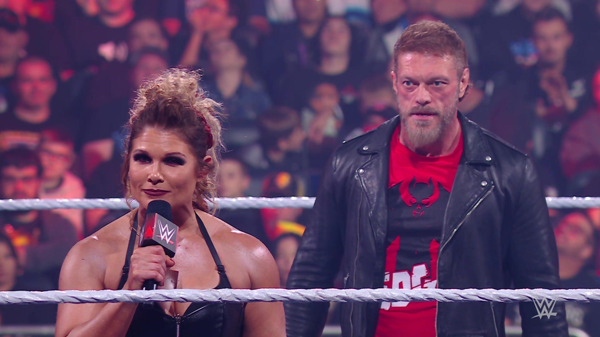 Beth Phoenix and Edge.