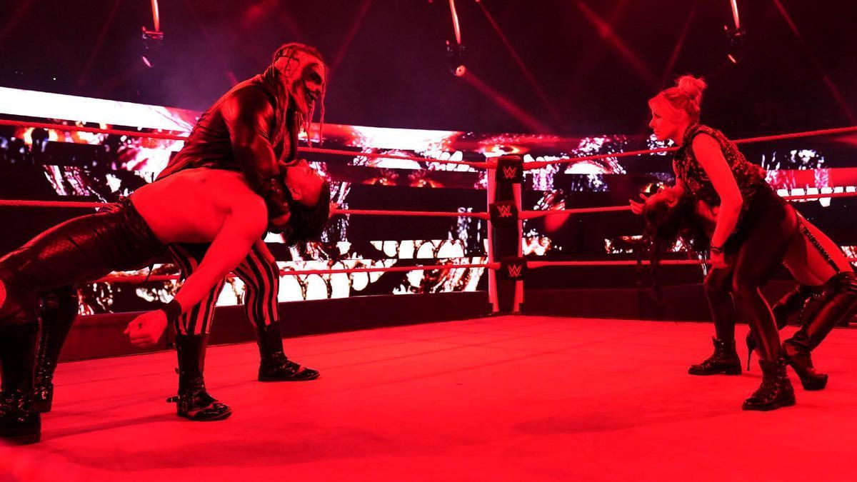 Alexa Bliss and Bray Wyatt setting up for a dual Sister Abigail on Andrade and Zelina Vega