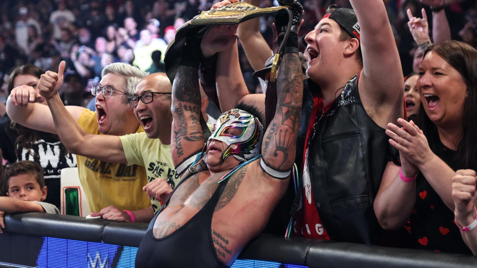 Rey Mysterio celebrating. Image Credits: wwe.com 