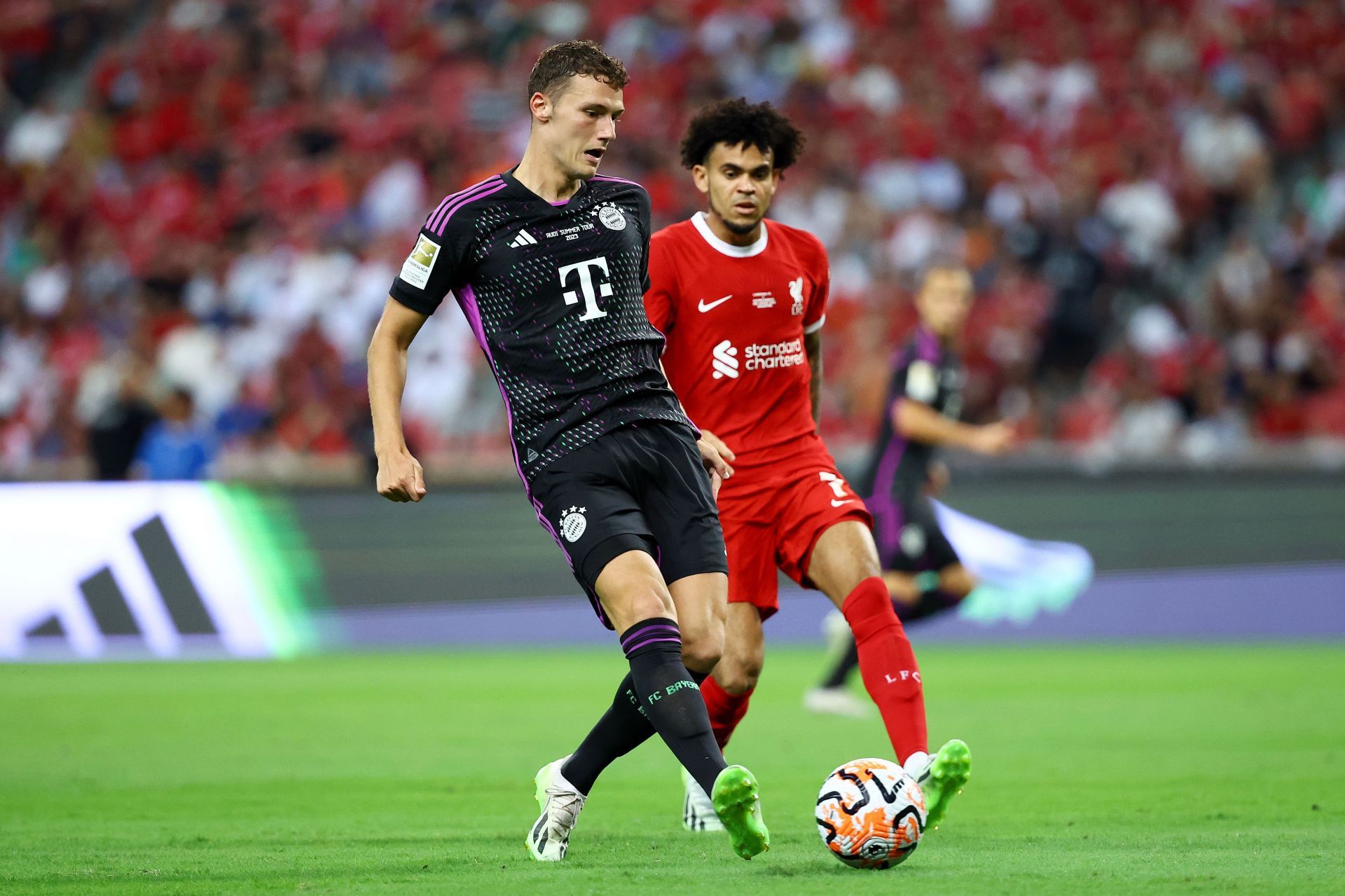 Benjamin Pavard (left) is wanted at Old Trafford.