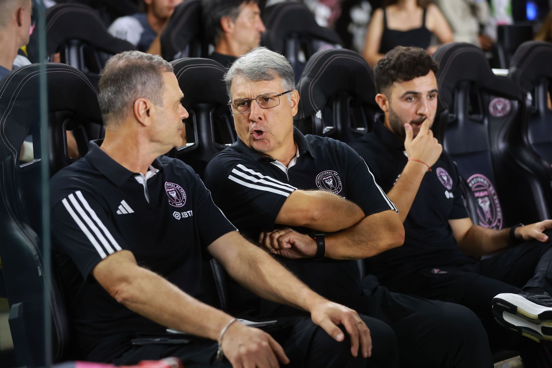 Gerardo Martino (middle) quashed suggestions Lionel Messi might be injured.