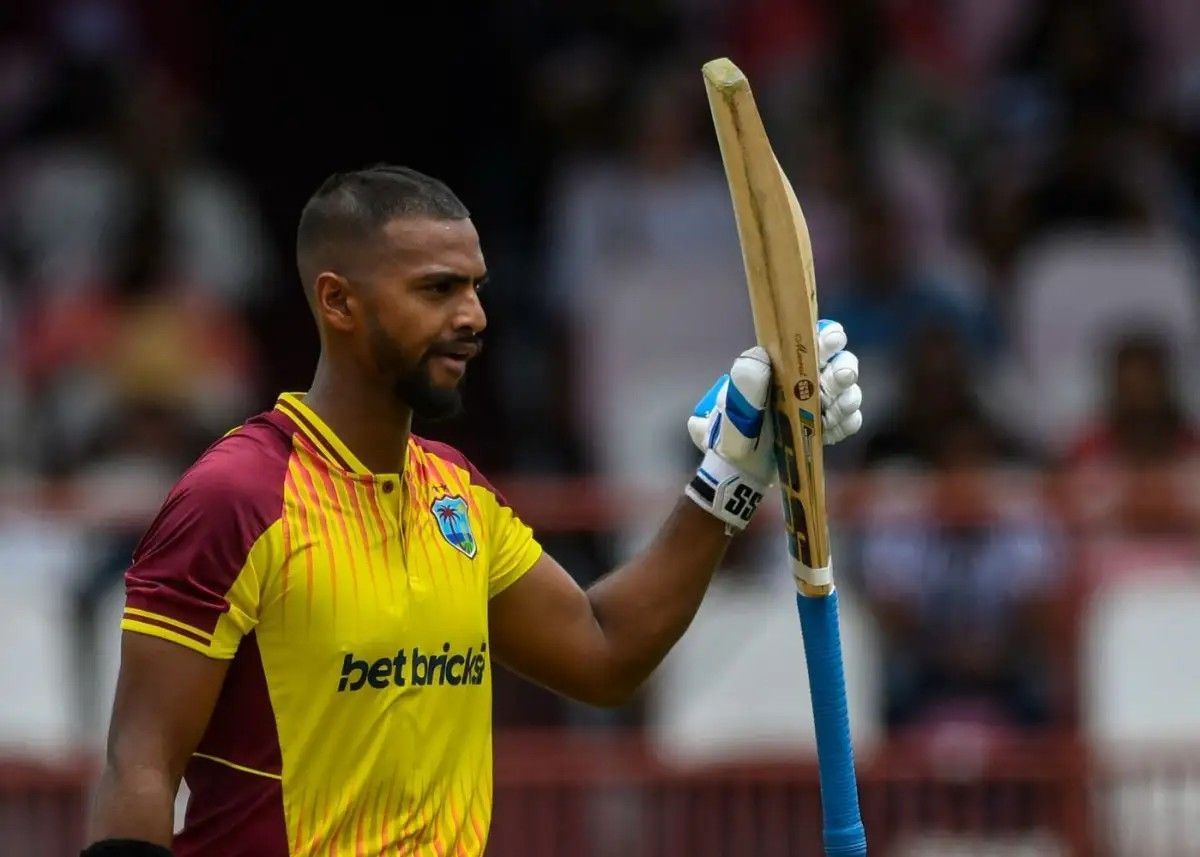 Nicholas Pooran raising his bat after a fifty [Getty Images]