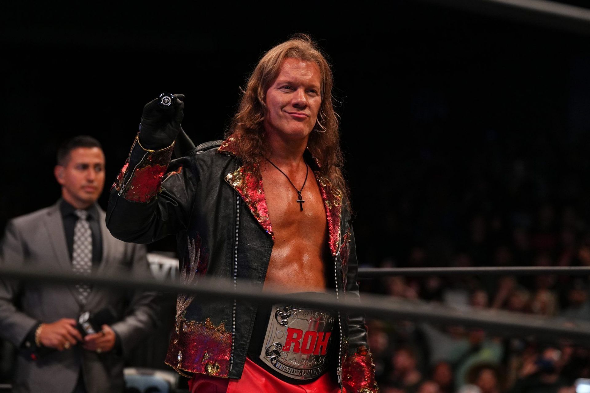 Chris Jericho with the ROH Championship.