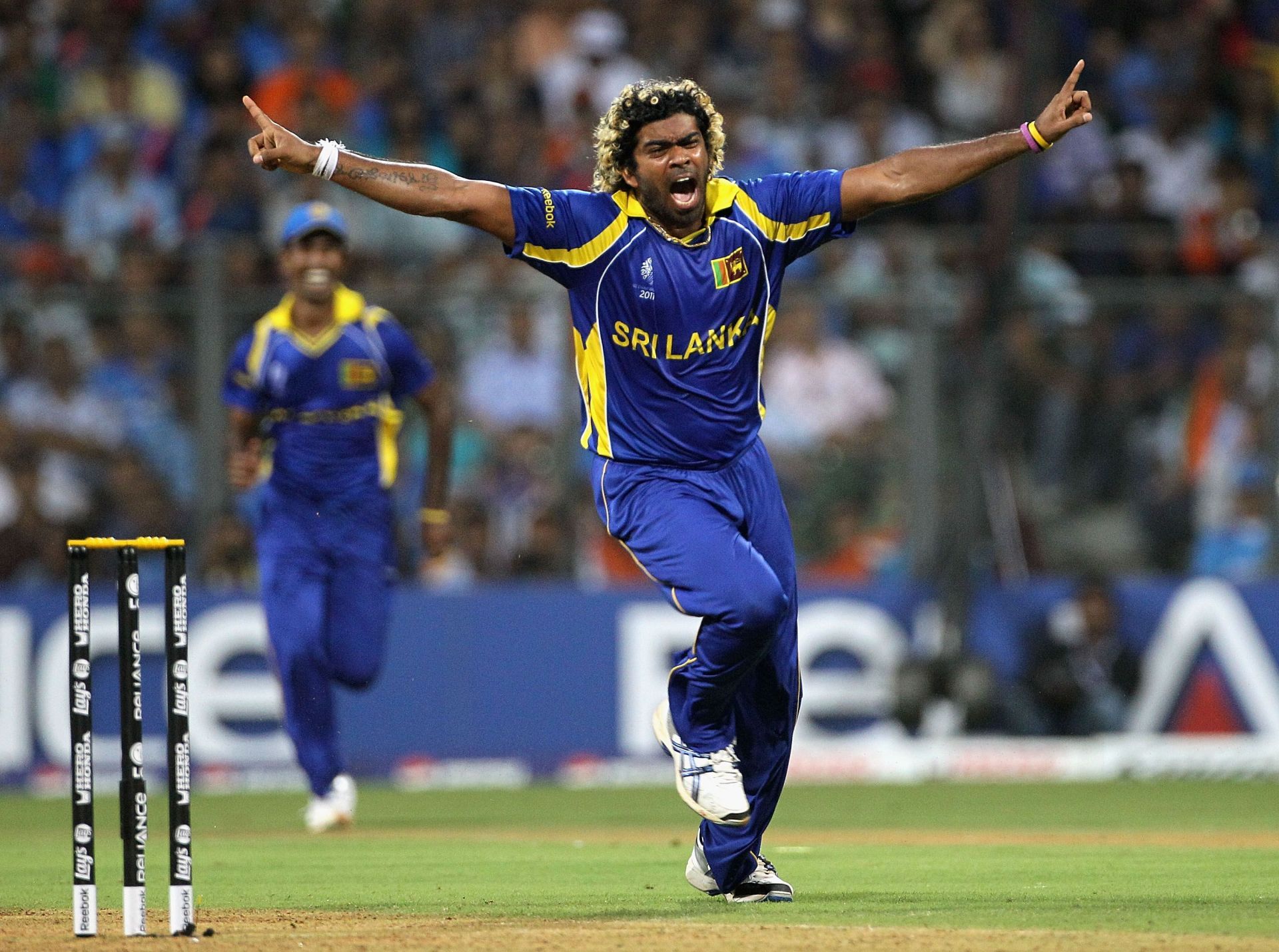 Lasith Malinga celebrating after dismissing Sachin Tendulkar [Getty Images]