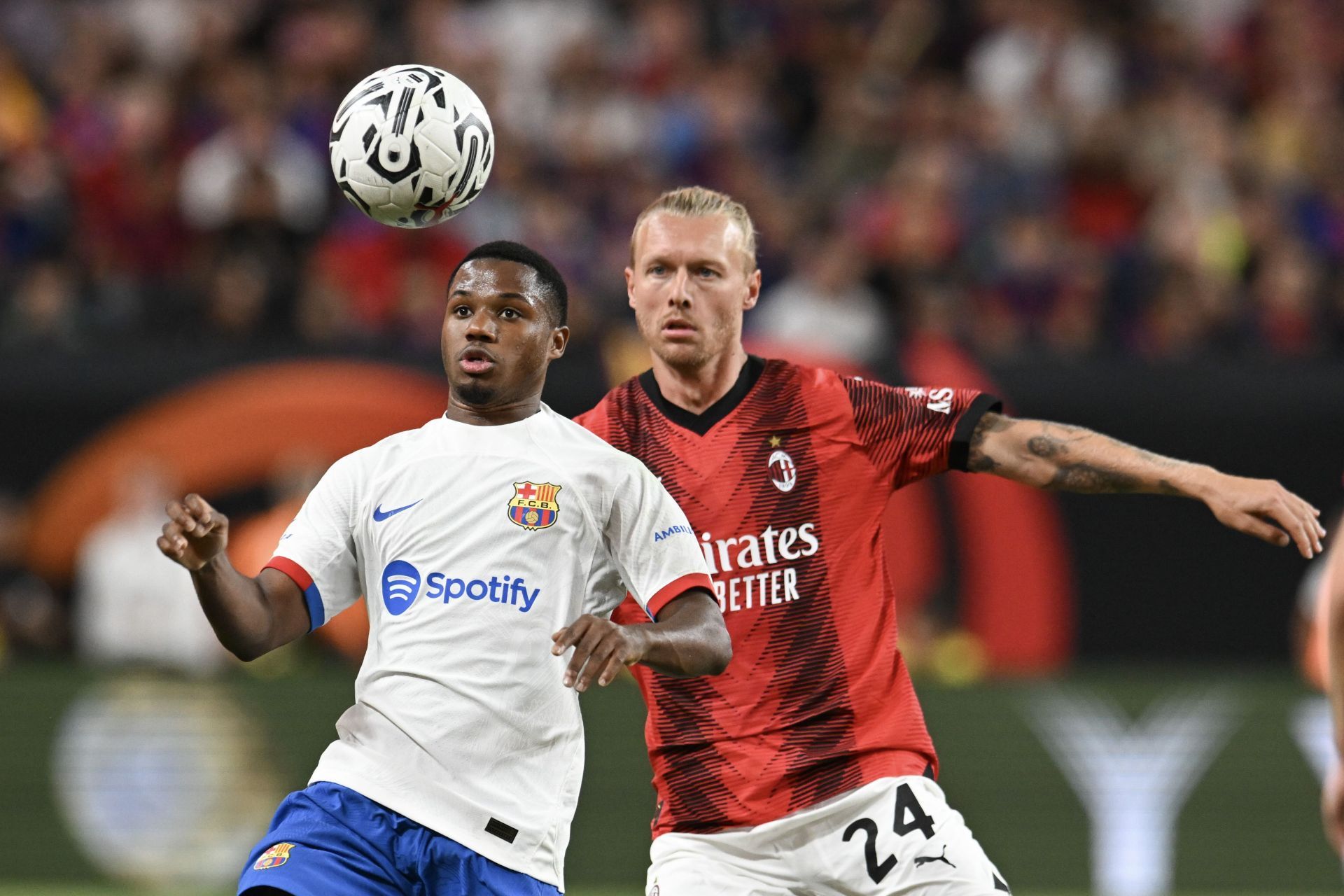 Ansu Fati (left) is eager to stay at the Camp Nou.