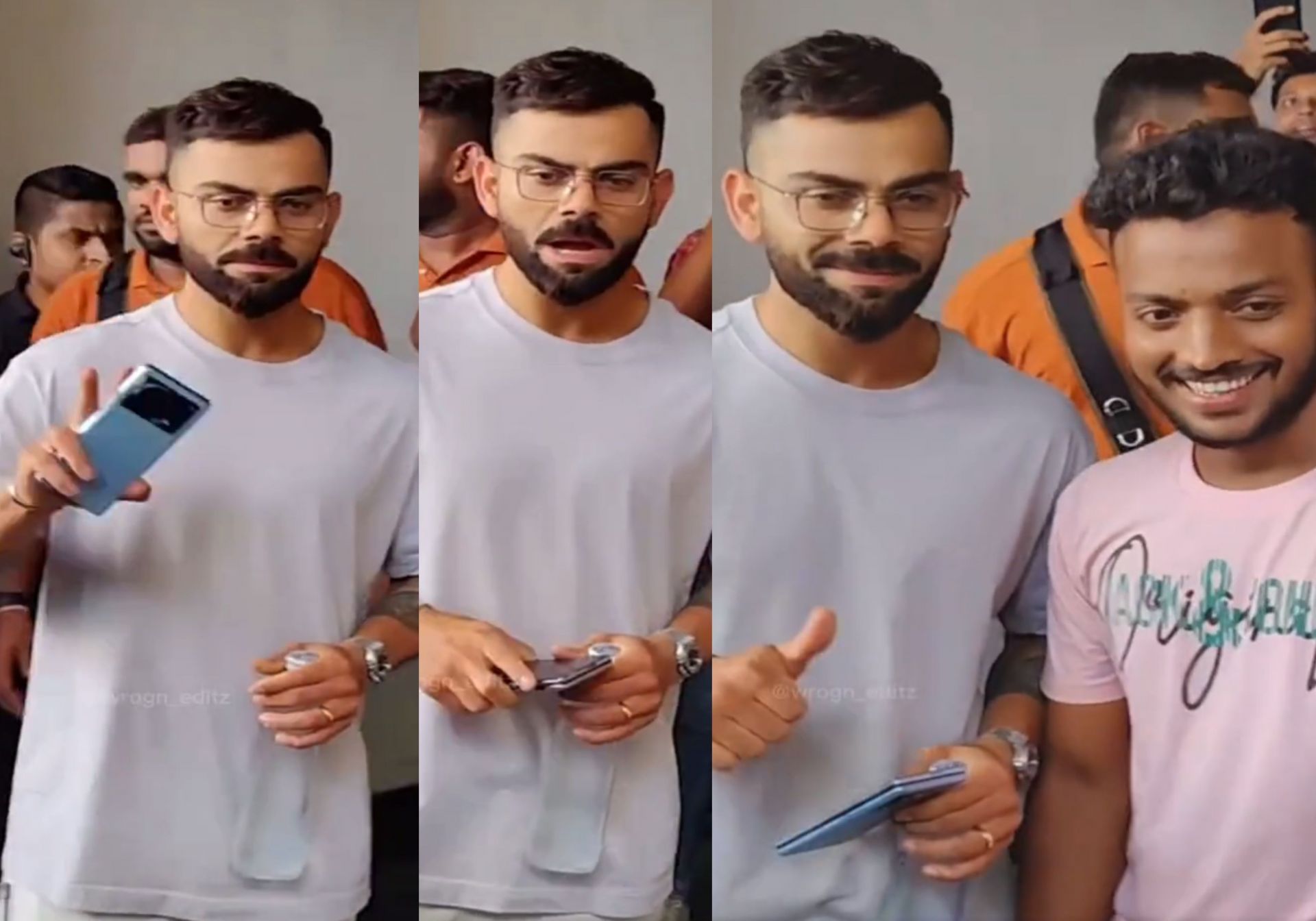 Virat Kohli clicking pictures with his fans. 
