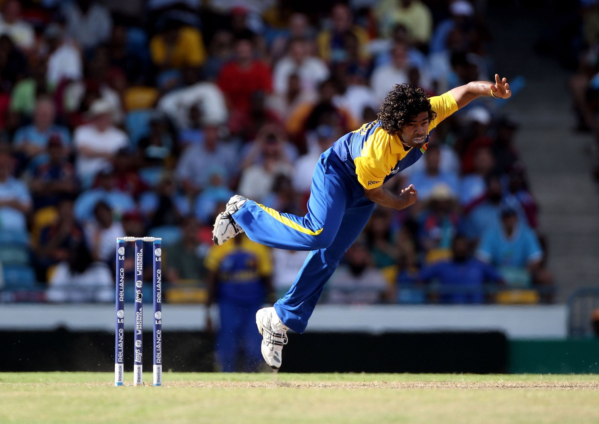 Lasith Malinga during ICC T20 World Cup 2010 [Getty Images]