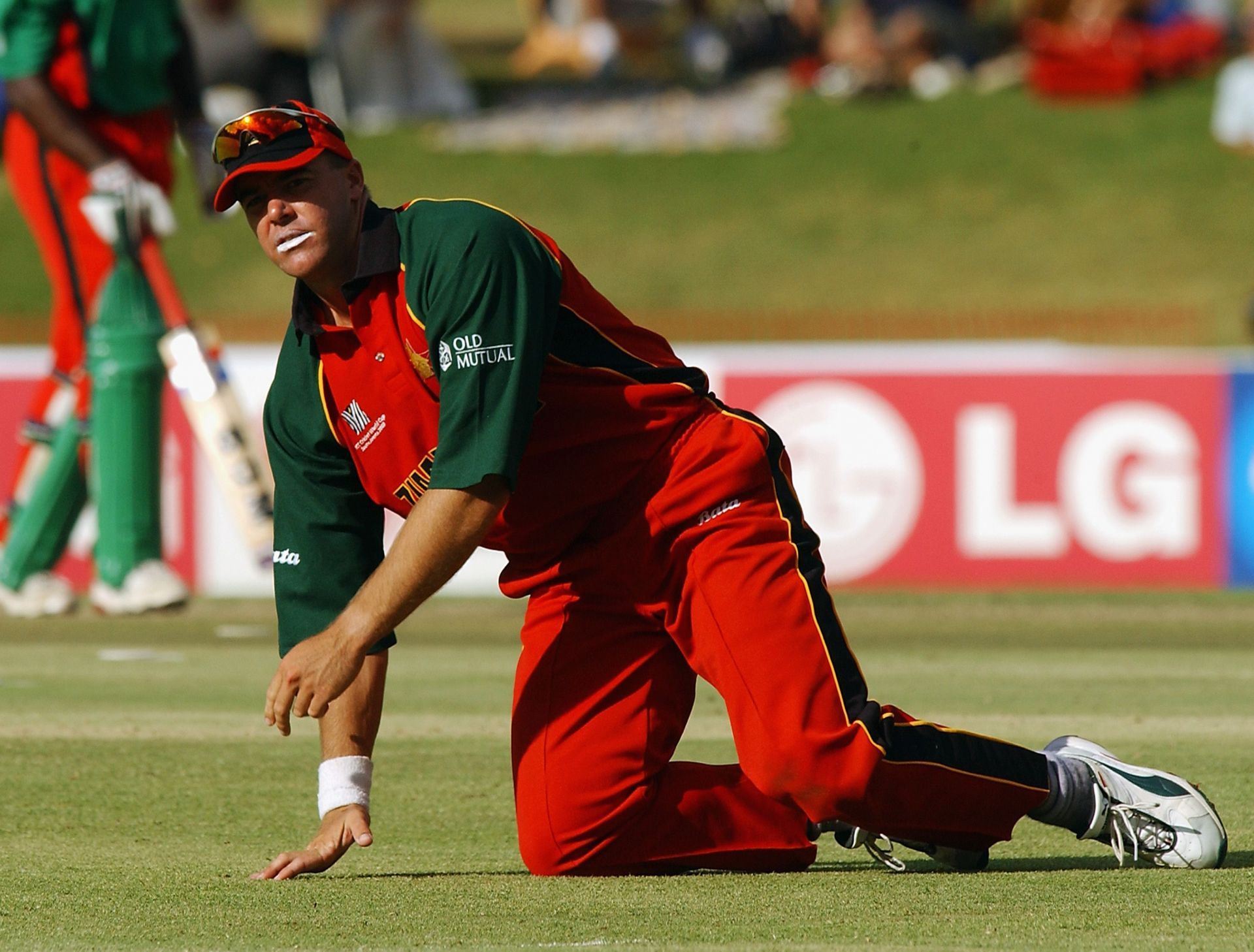 Heath Streak of Zimbabwe looks on as Kenya clock up