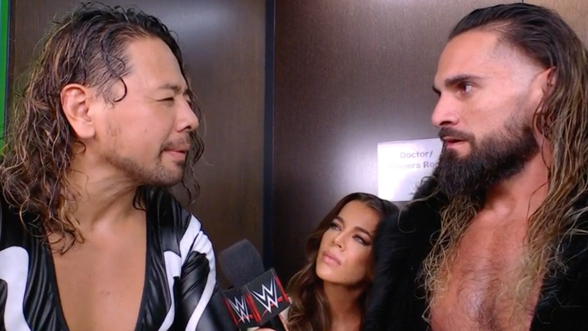 Seth Rollins, Shinsuke Nakamura, and Jackie Redmond