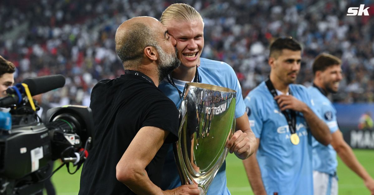 Pep Guardiola embraces Erling Haaland after Manchester City