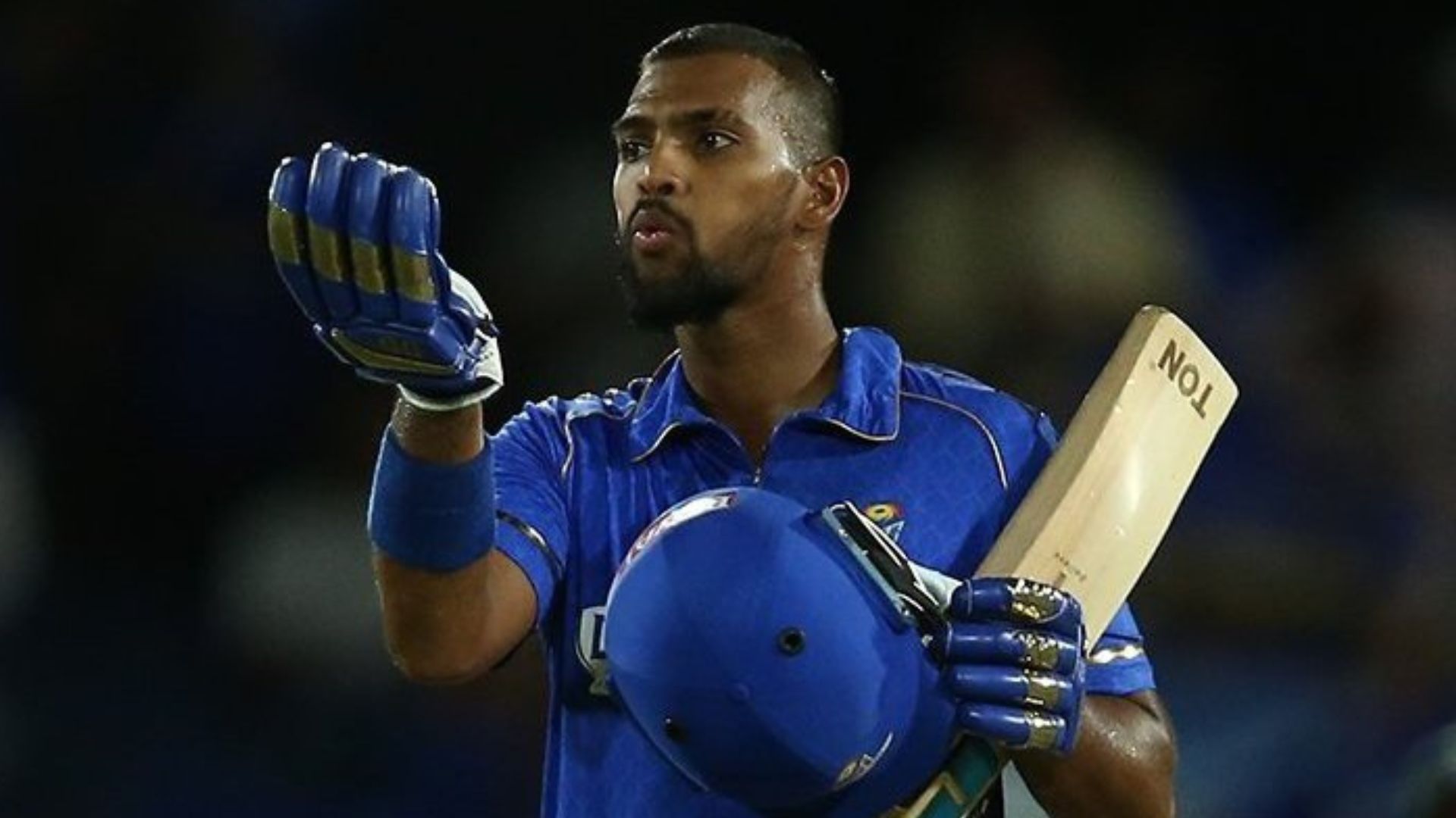 Nicholas Pooran celebrates his century during the MLC final. 