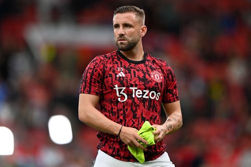 Luke Shaw of Manchester United looks on