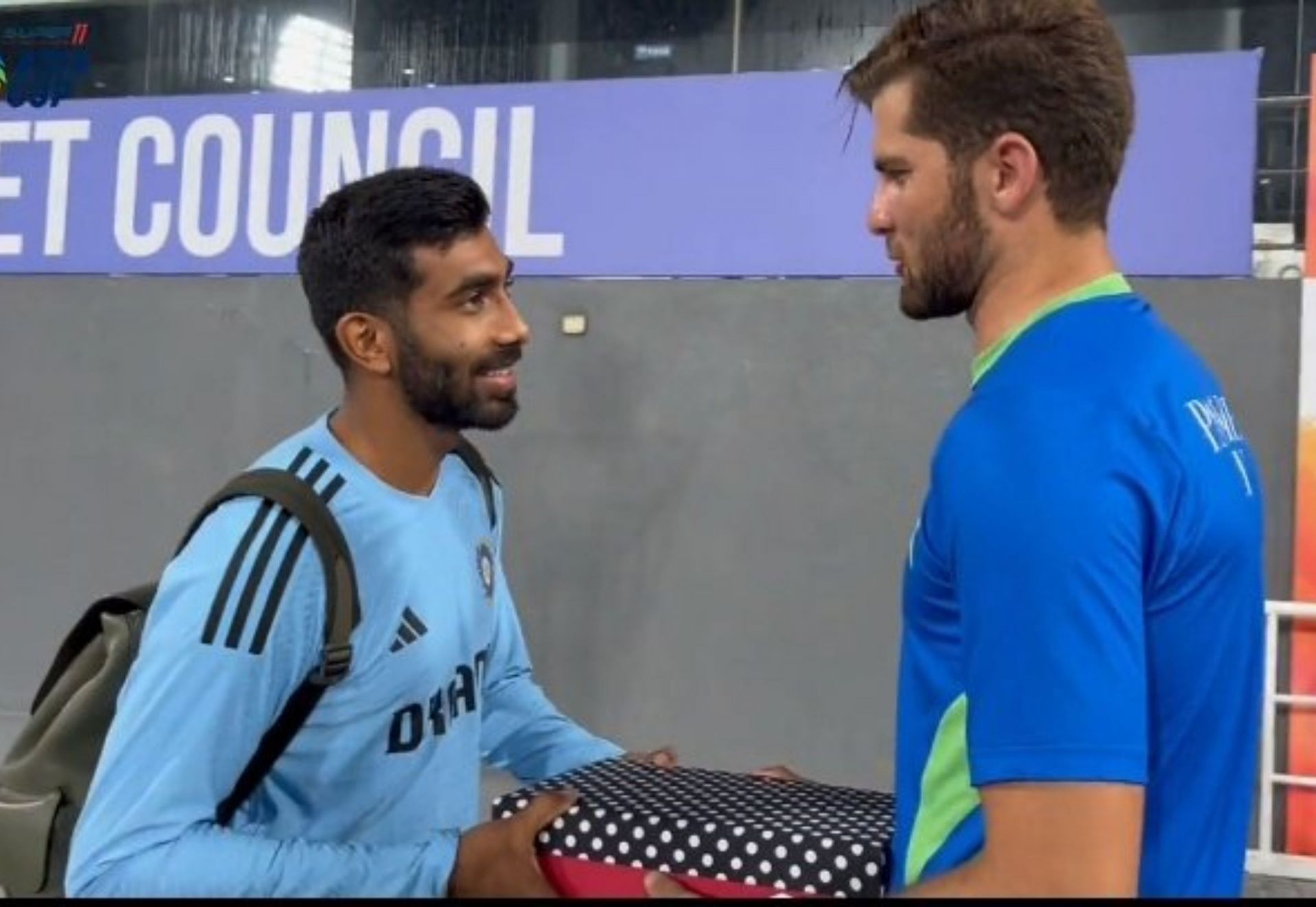 Shaheen Afridi with Jasprit Bumrah after the play ended on Sunday. 