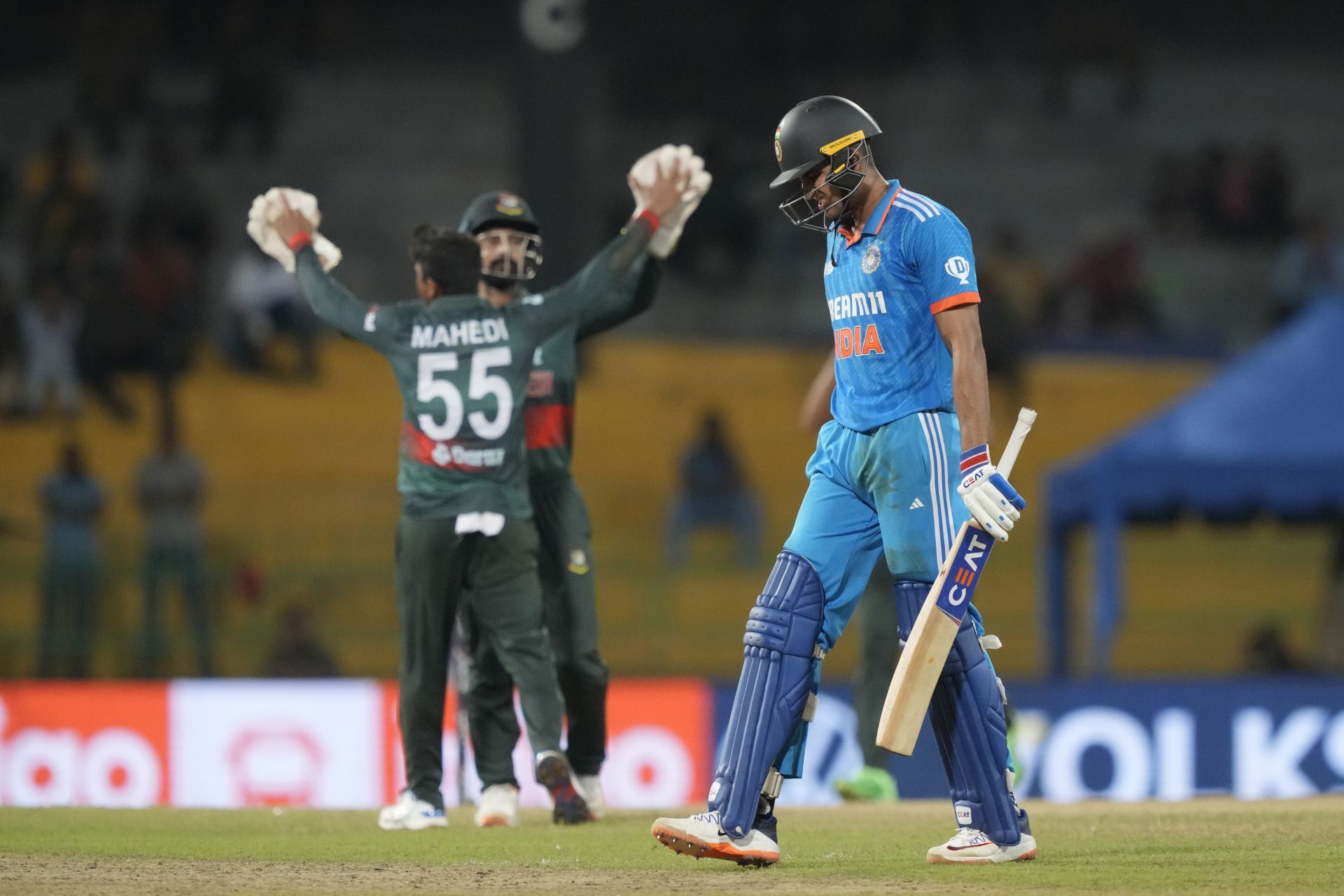 Mahedi Hasan celebrates the dismissal of India&rsquo;s centurion in Colombo. (Pic: AP)