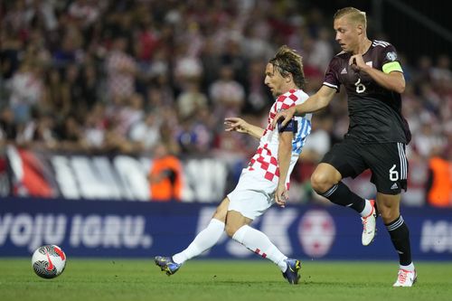 Luka Modric (left)'s contract at the Santiago Bernabeu expires next summer.