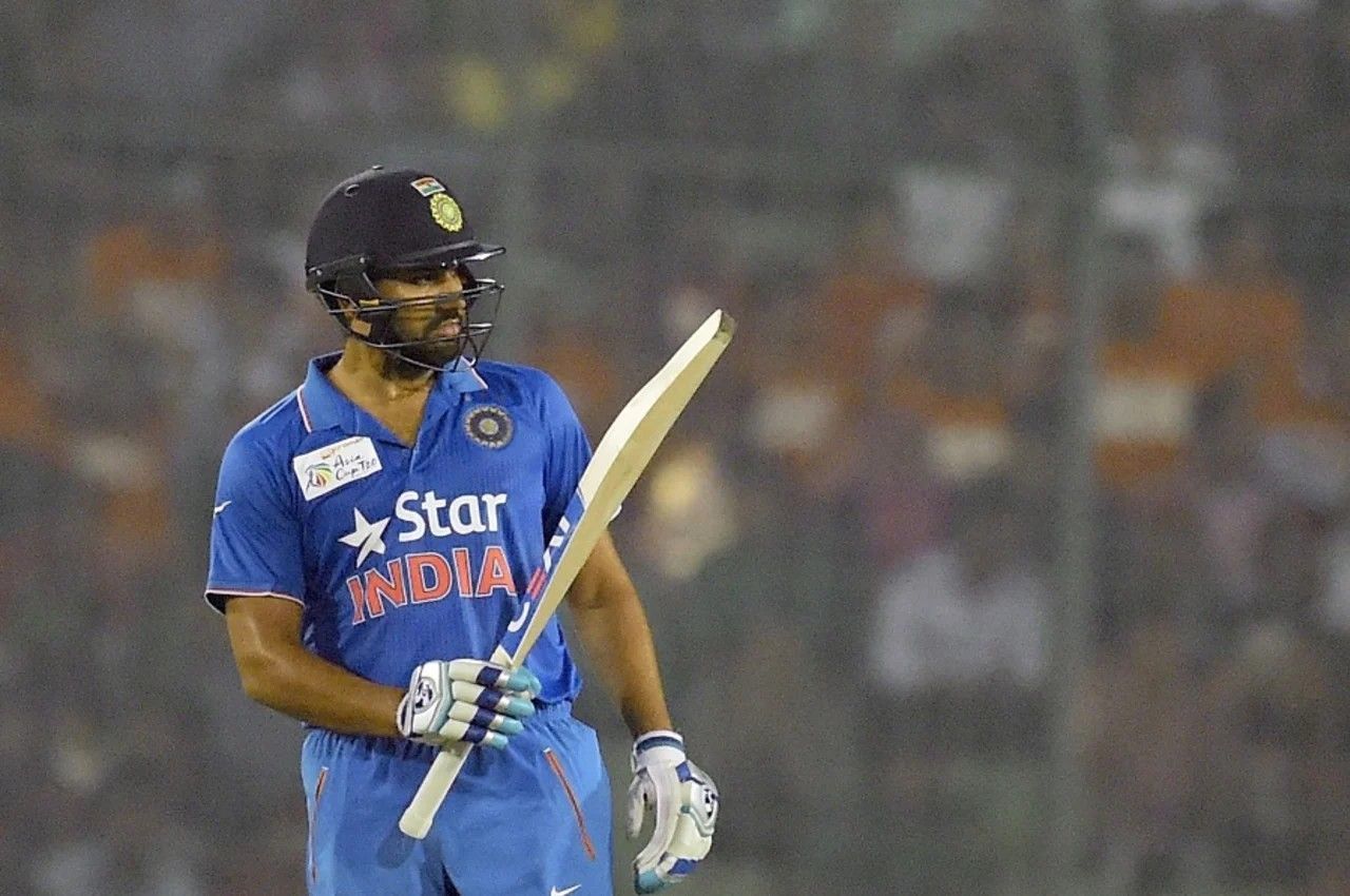 Rohit Sharma acknowledging his fifty vs Bangladesh [Getty Images]