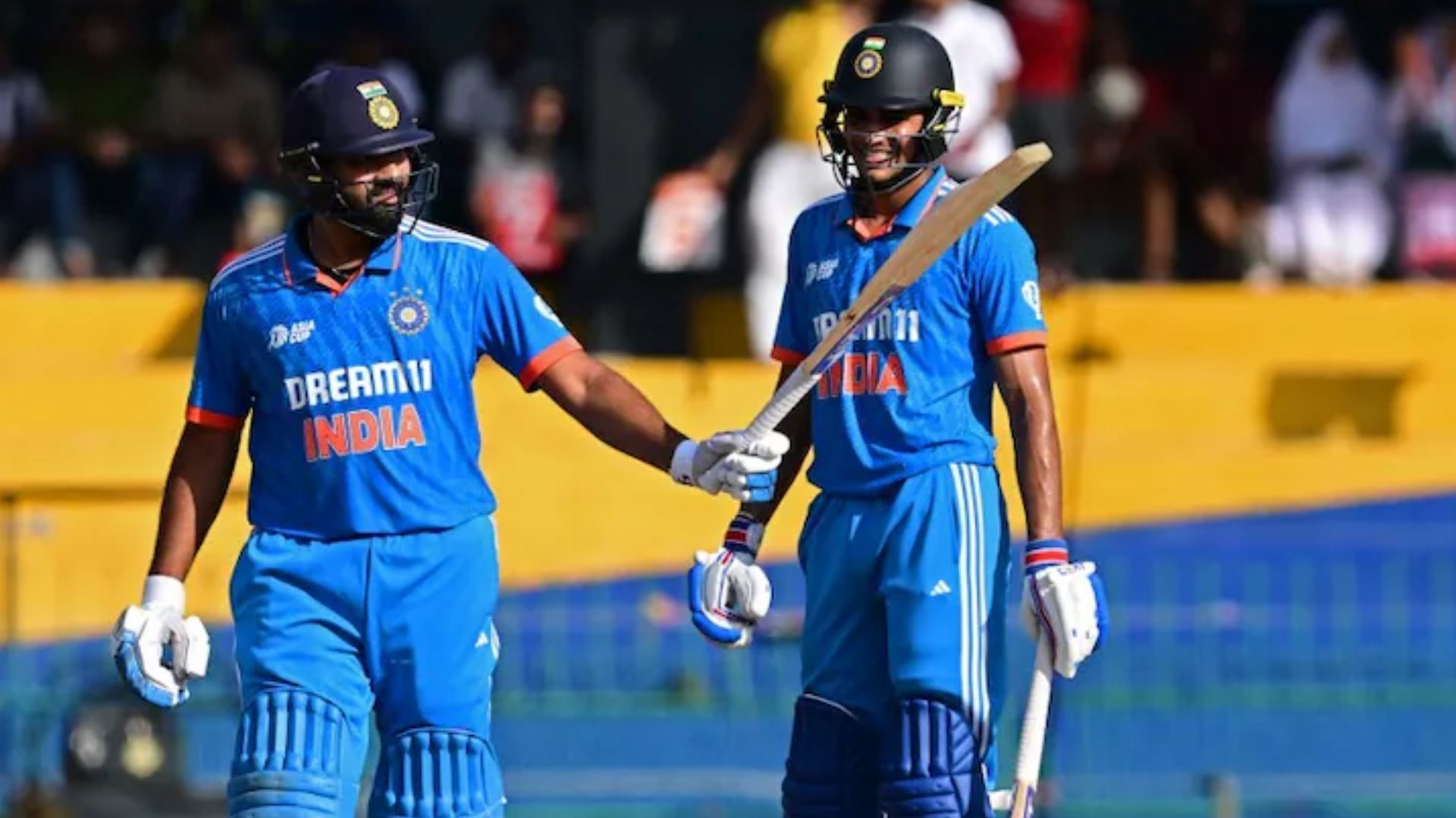 Rohit Sharma (L) celebrates after scoring his half-century against Pakistan (P.C.: X)