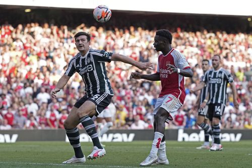 Harry Maguire (left) opted not to leave Old Trafford this summer.