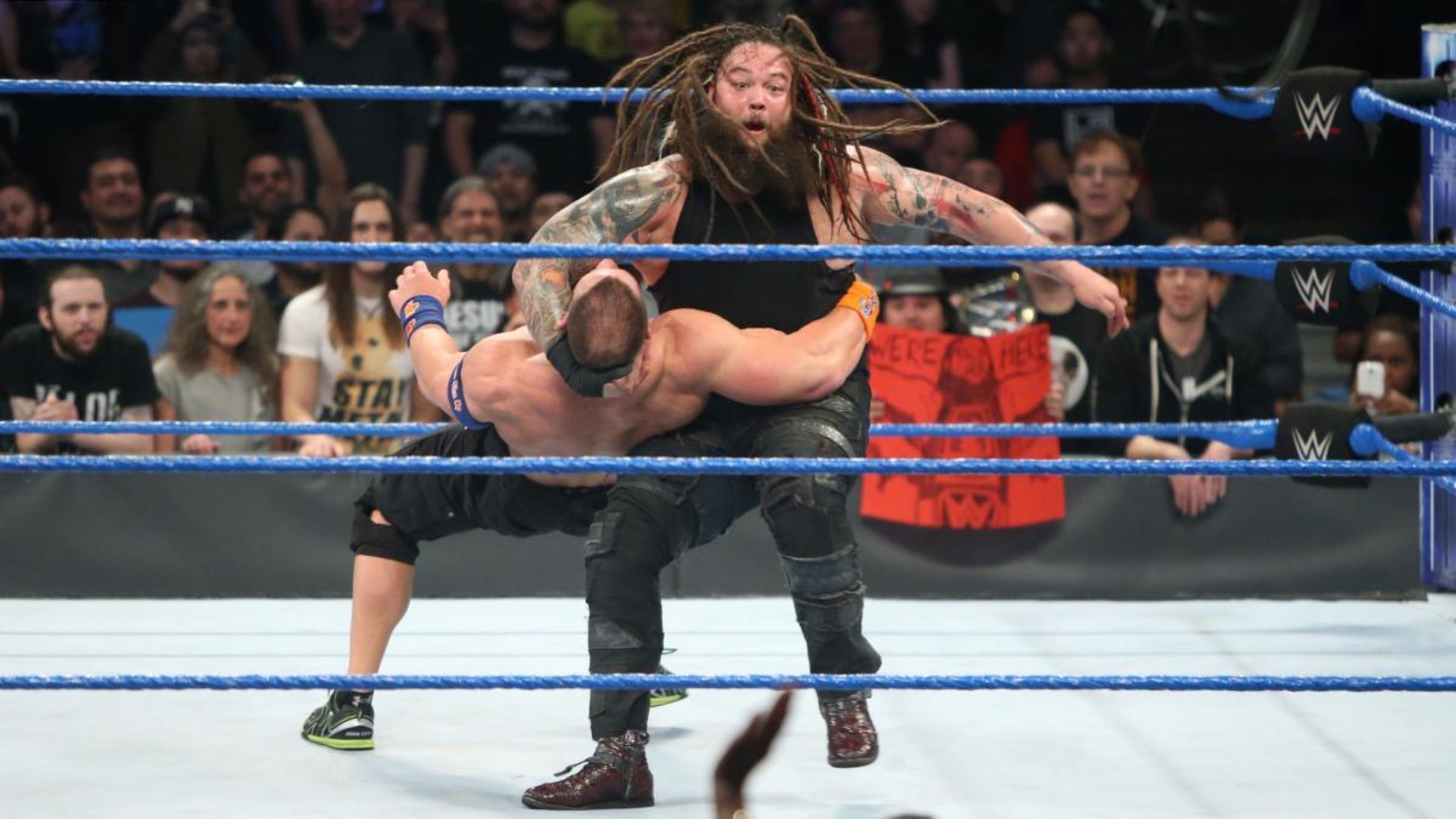 Bray Wyatt hitting John Cena with Sister Abigail