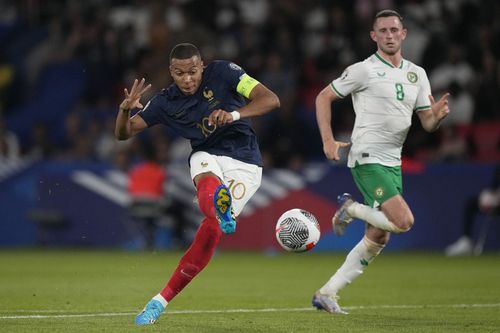 Kylian Mbappe (left) has admirers at Anfield.