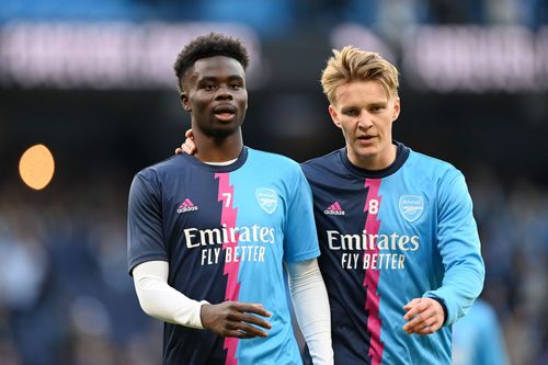 Bukayo Saka (left) and Martin Odegaard