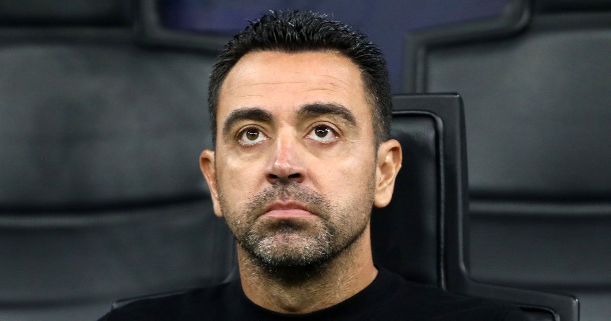 Barcelona manager Xavi Hernandez looks on.