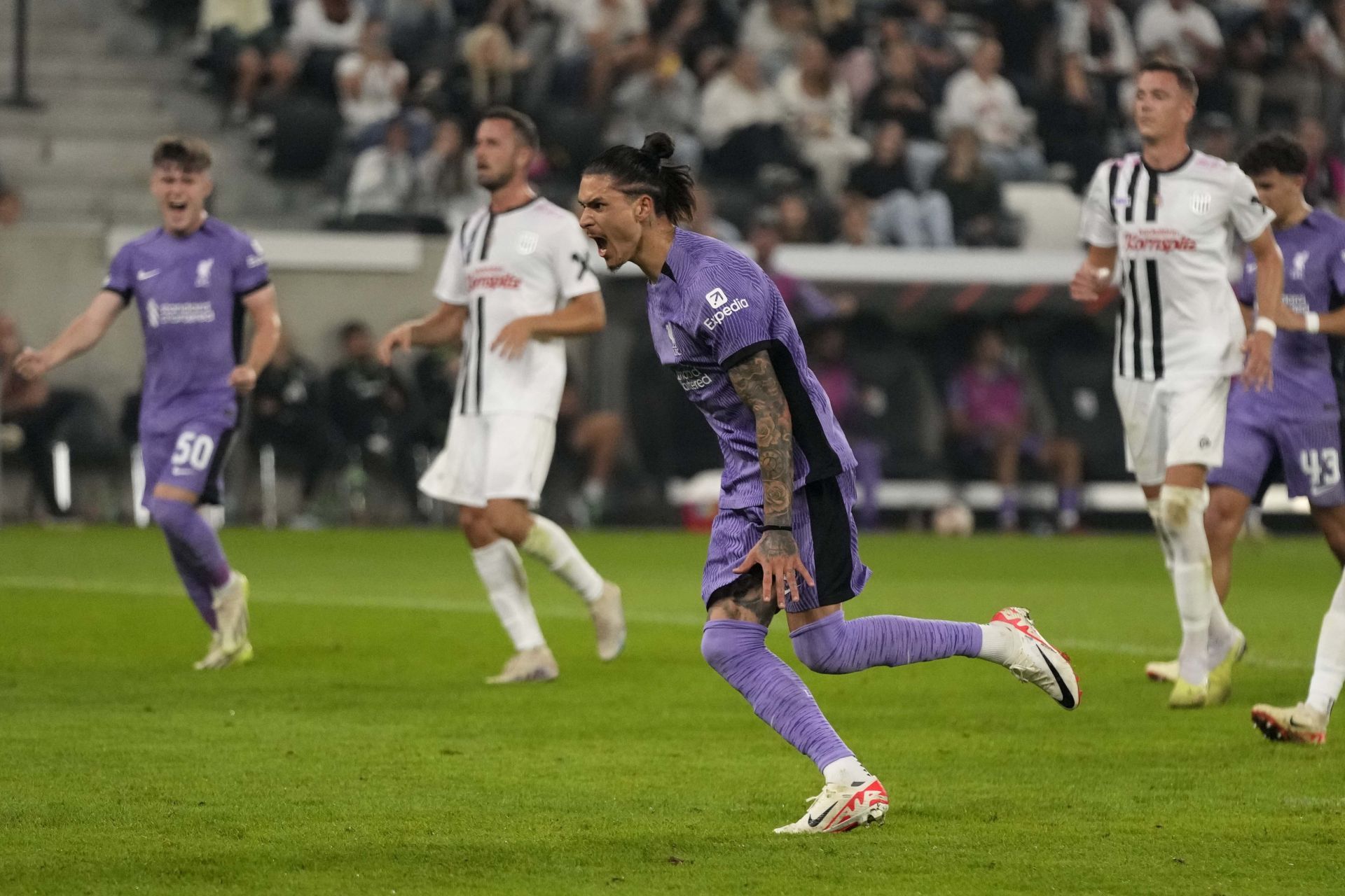 Darwin Nunez celebrates after scoring from the spot.