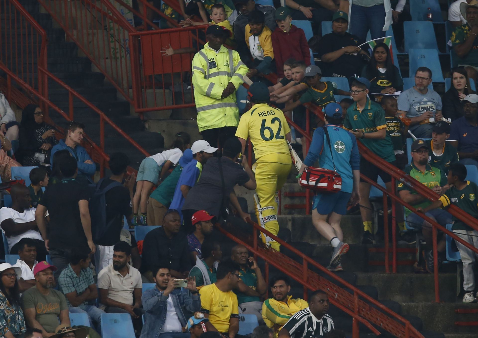 Australia&#039;s Travis Head leaves the field after receiving medical attention