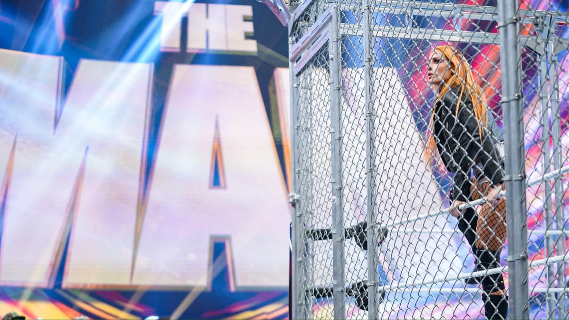 Becky Lynch inside a steel cage at WWE Payback.