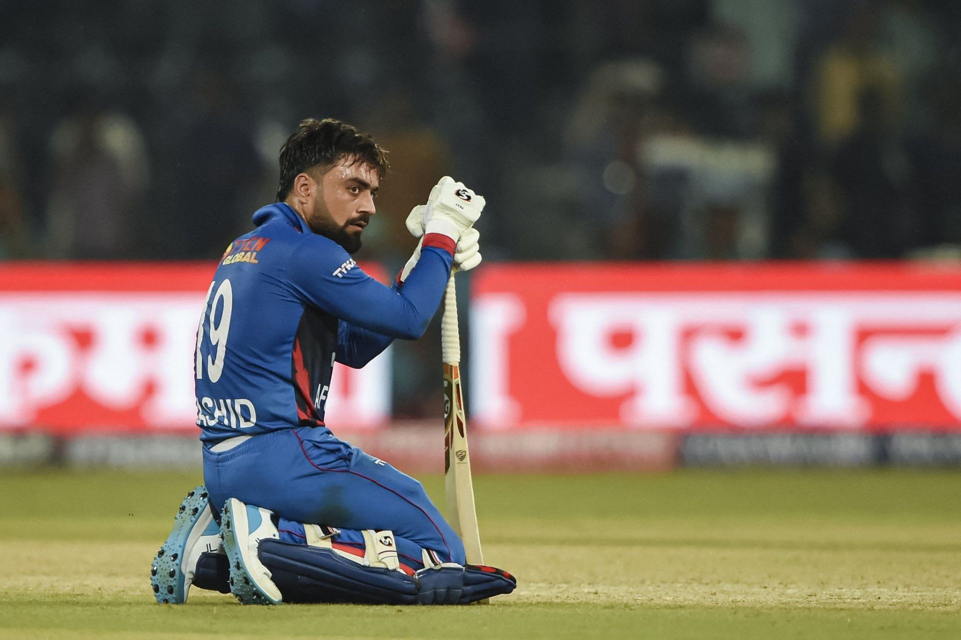 Rashid Khan is down on his knees after defeat to Sri Lanka. (Credits: Twitter)