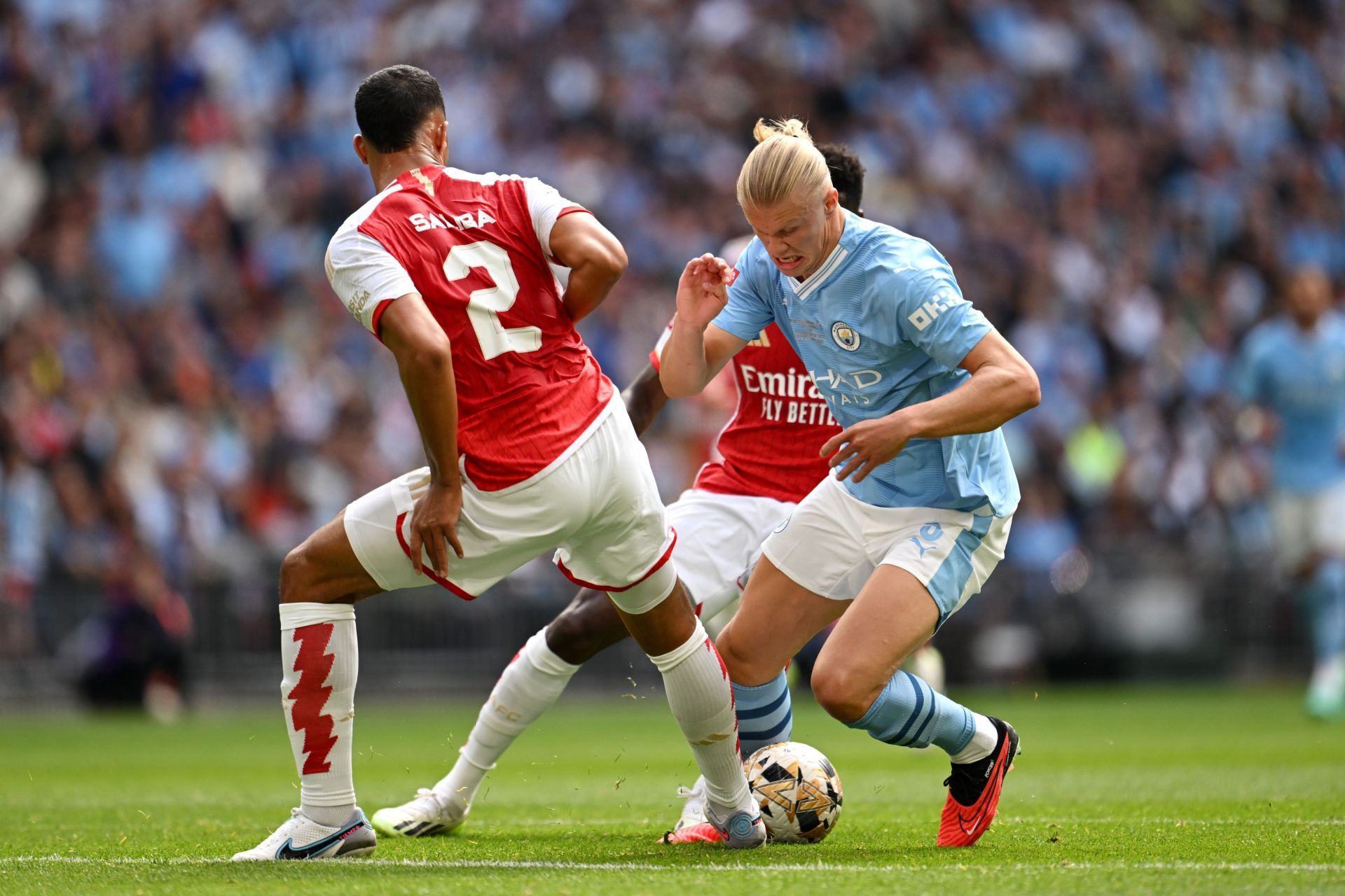 William Saliba and Erling Haaland (via Getty Images)