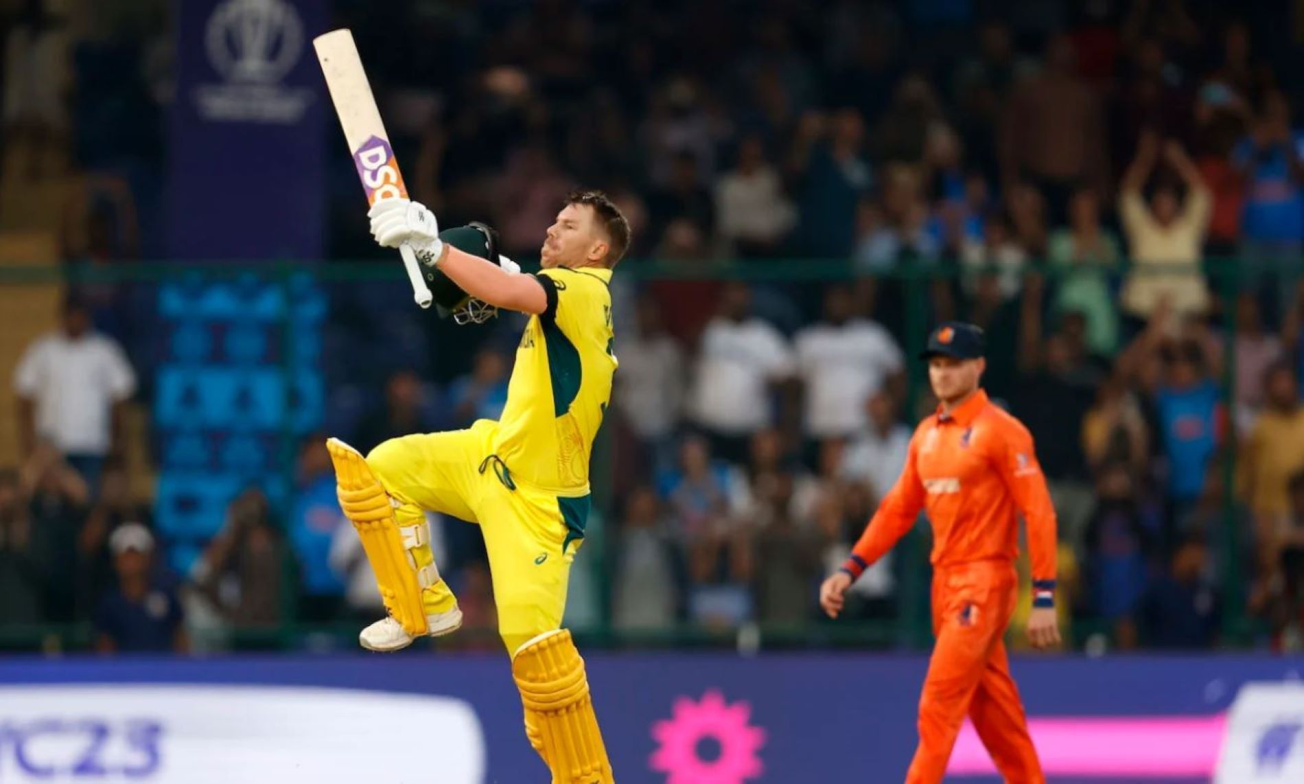 Warner celebrates reaching his second ton of the 2023 World Cup