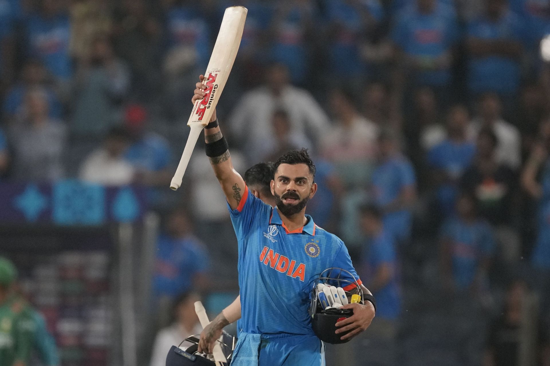 Virat Kohli raising his bat after India's win vs Bangladesh [Getty Images]