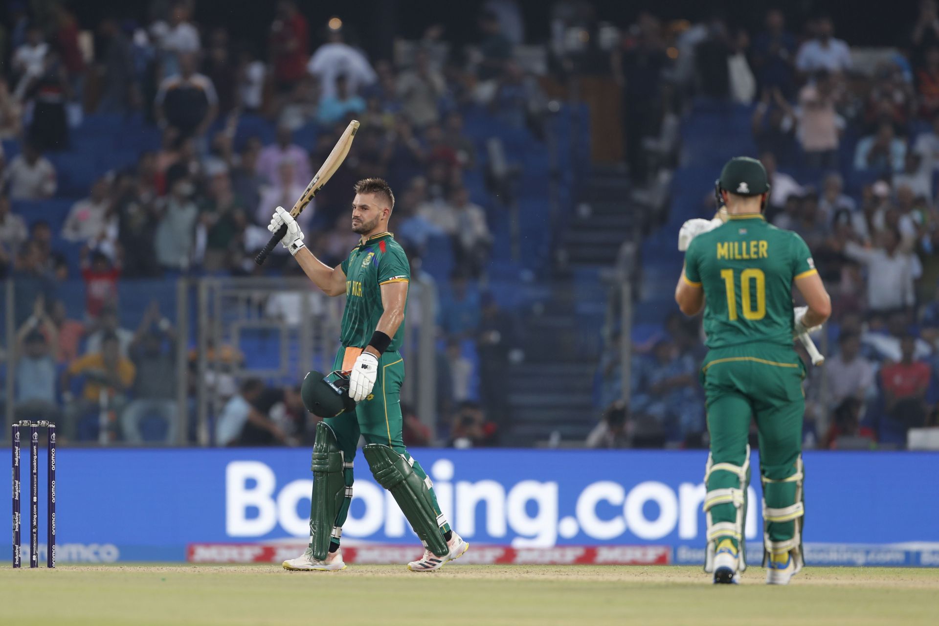 Aiden Markram raising his bat after a superlative century during the SA vs SL - ICC Men&#039;s Cricket World Cup 2023