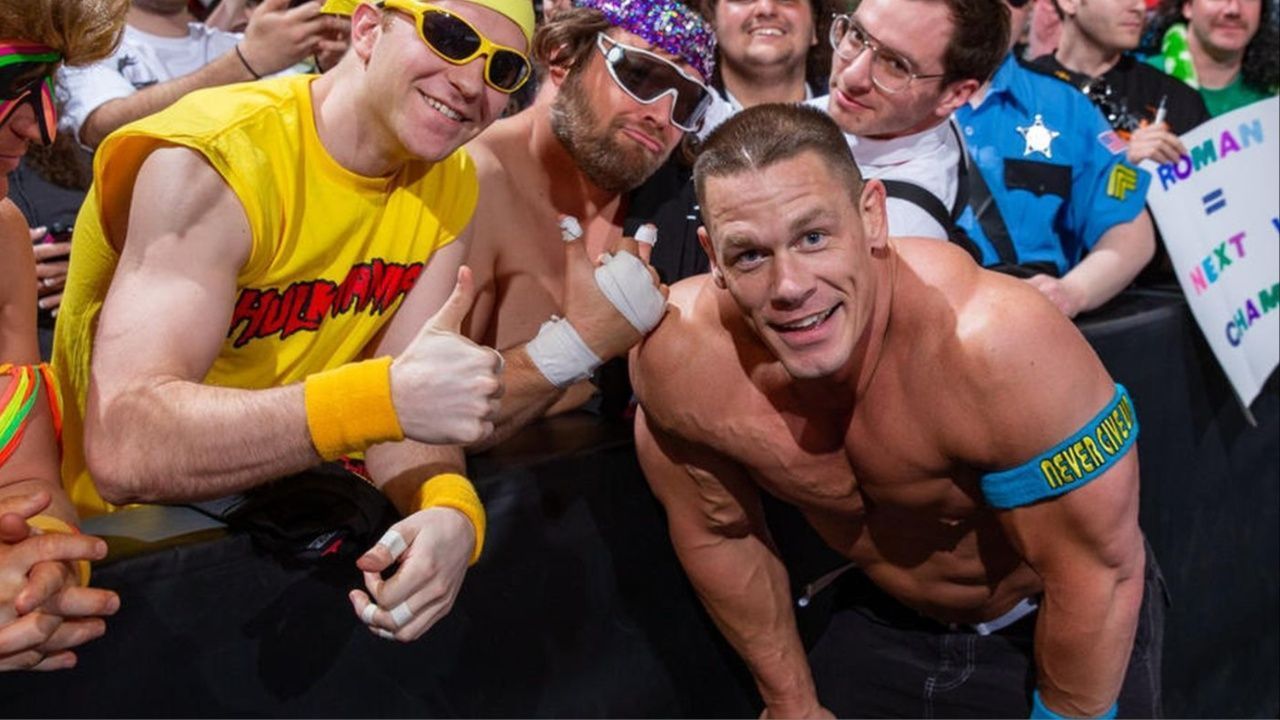 John Cena with his fans at a WWE event.