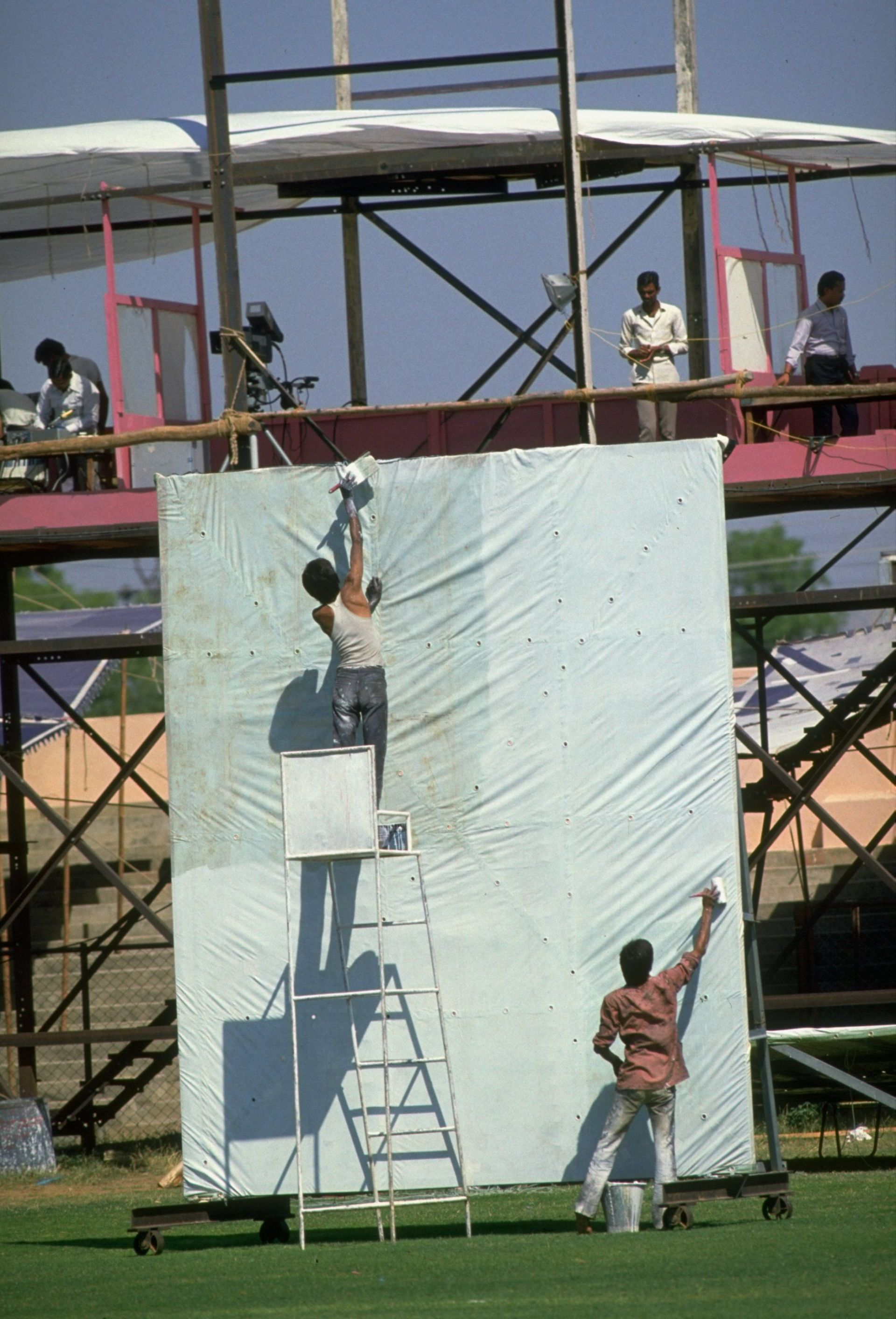 A sightscreen being painted during the 1987 World Cup.