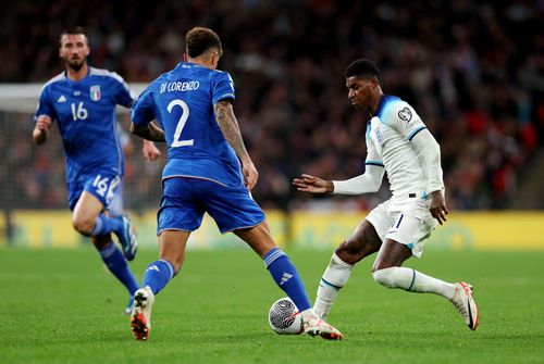 Marcus Rashford (right) scored while on international duty.