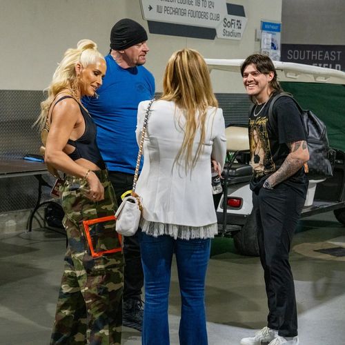 Dominik, alongside The Undertaker and Michelle McCool