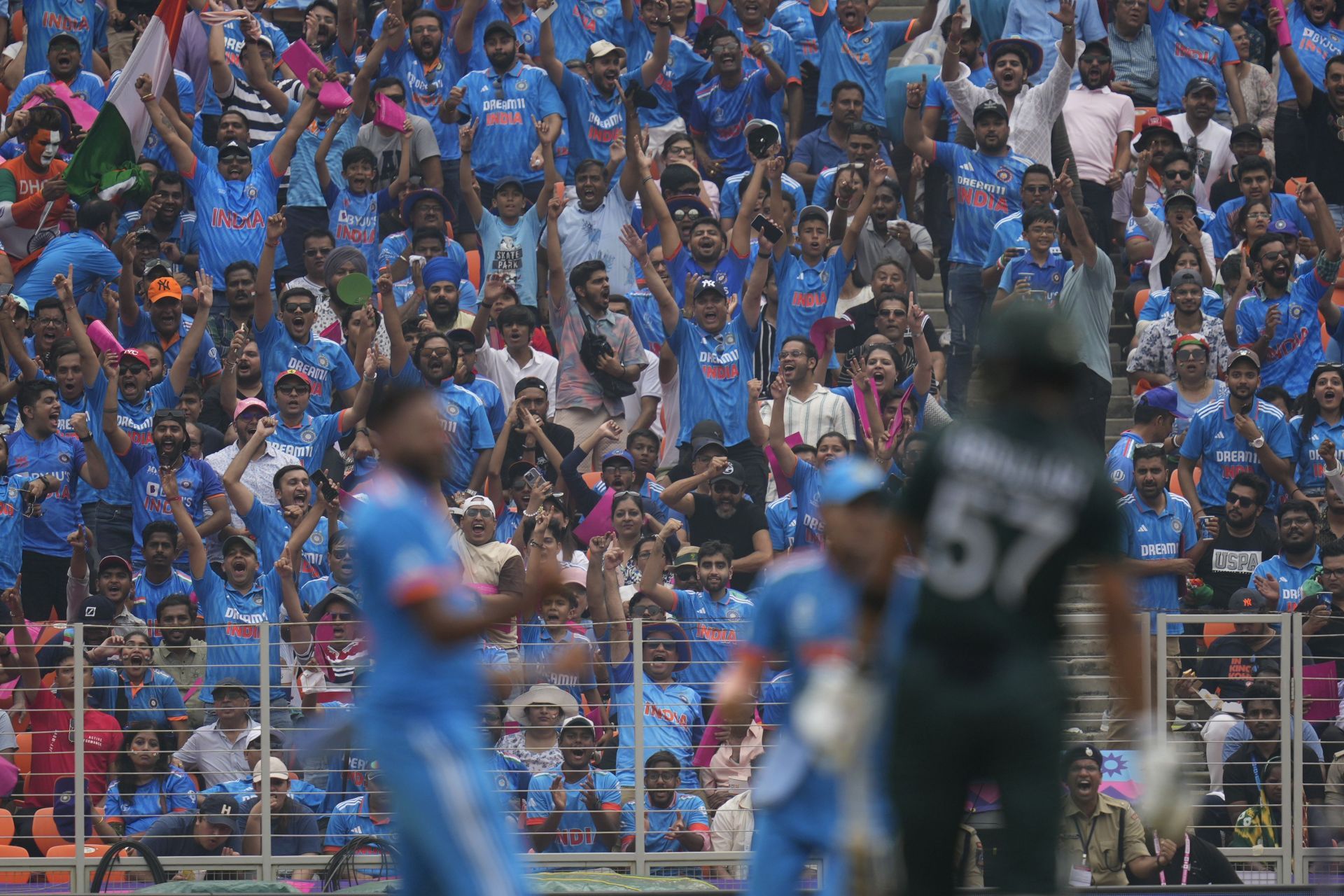 Indian fans cheer after a Pakistan wicket falls during the World Cup match. (Pic: AP)