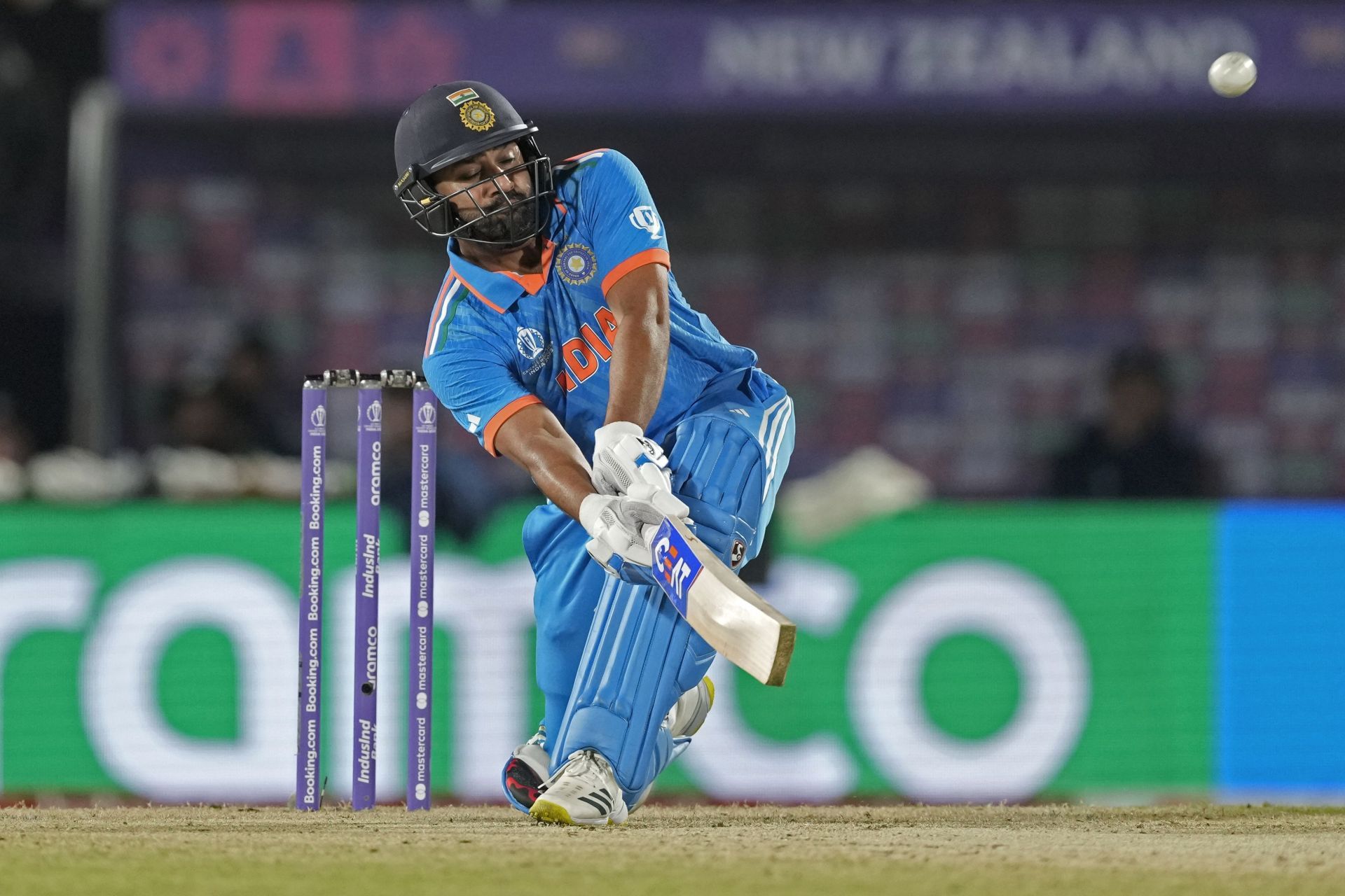 Rohit Sharma is pictured here contorting his body, but that's not the only gymnastics he has mastered