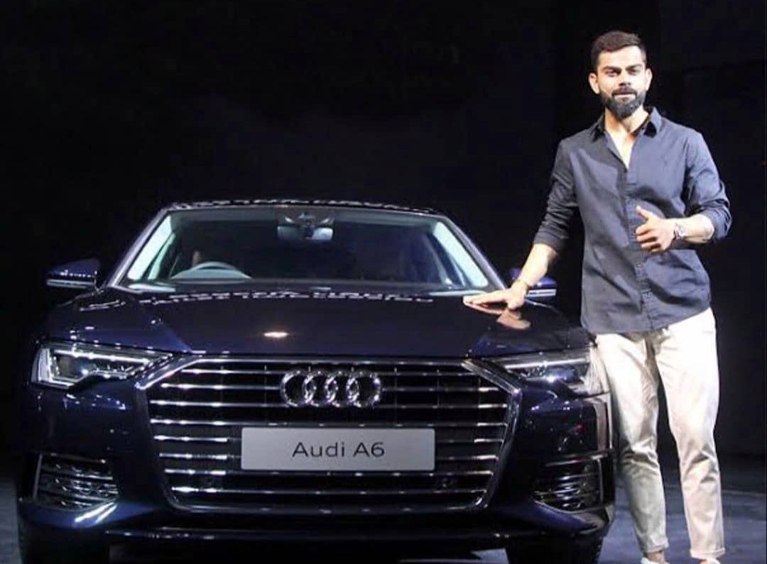 Virat Kohli posing with an Audi car [Instagram]