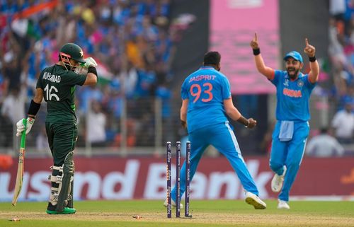 Jasprit Bumrah (center) won the POTM award against Pakistan.