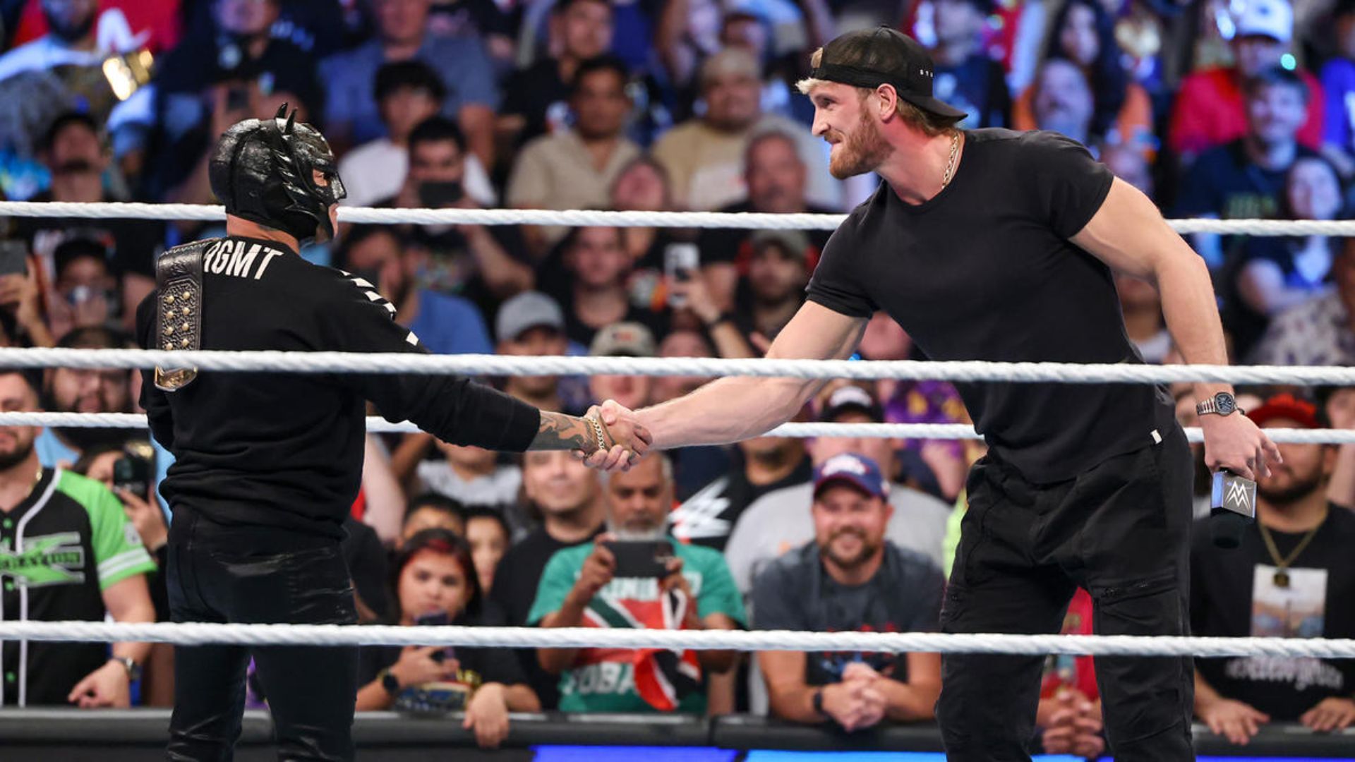 Rey Mysterio and Logan Paul. Image Credits: wwe.com 