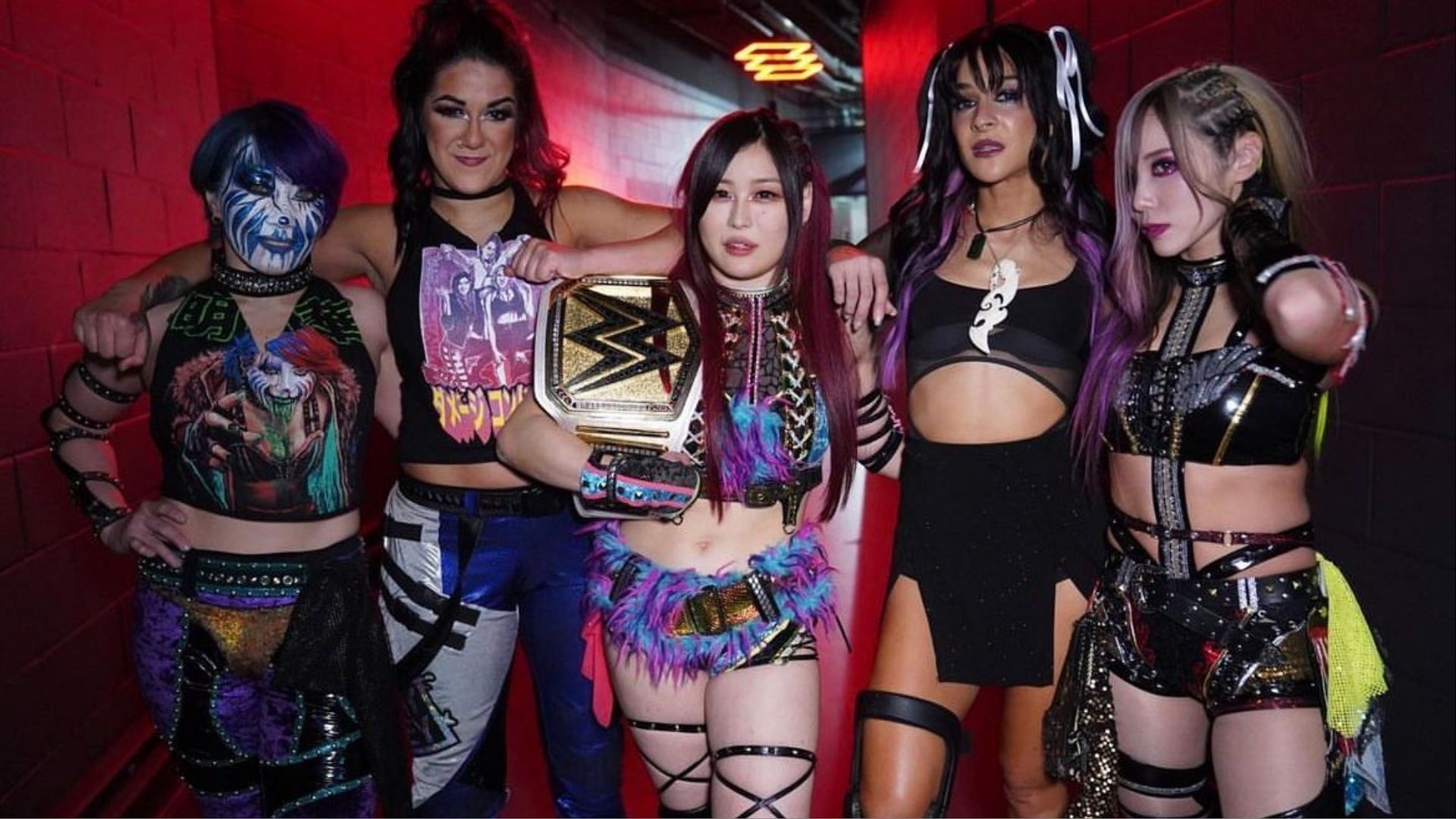 The members of Damage CTRL pose for a photograph on SmackDown