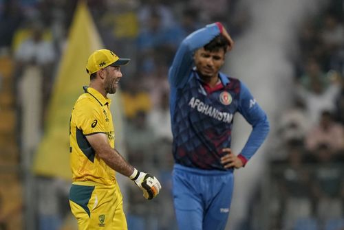 Glenn Maxwell and Mujeeb Ur Rahman [Getty Images]