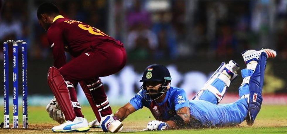Virat Kohli (right) waged a lone battle for India in the semi-final.